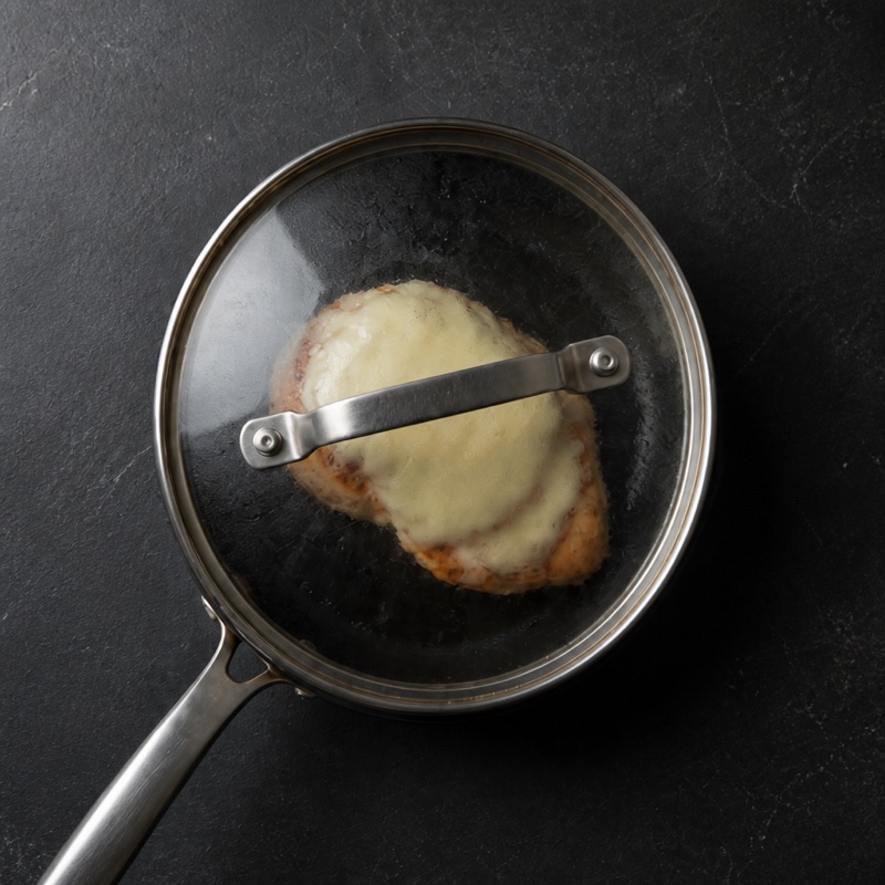 Step 2: Cheese on the hot chicken, lid on for 30 seconds.