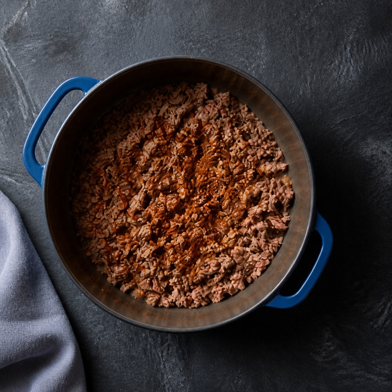 Step 1: Brown the turkey with the spices.
